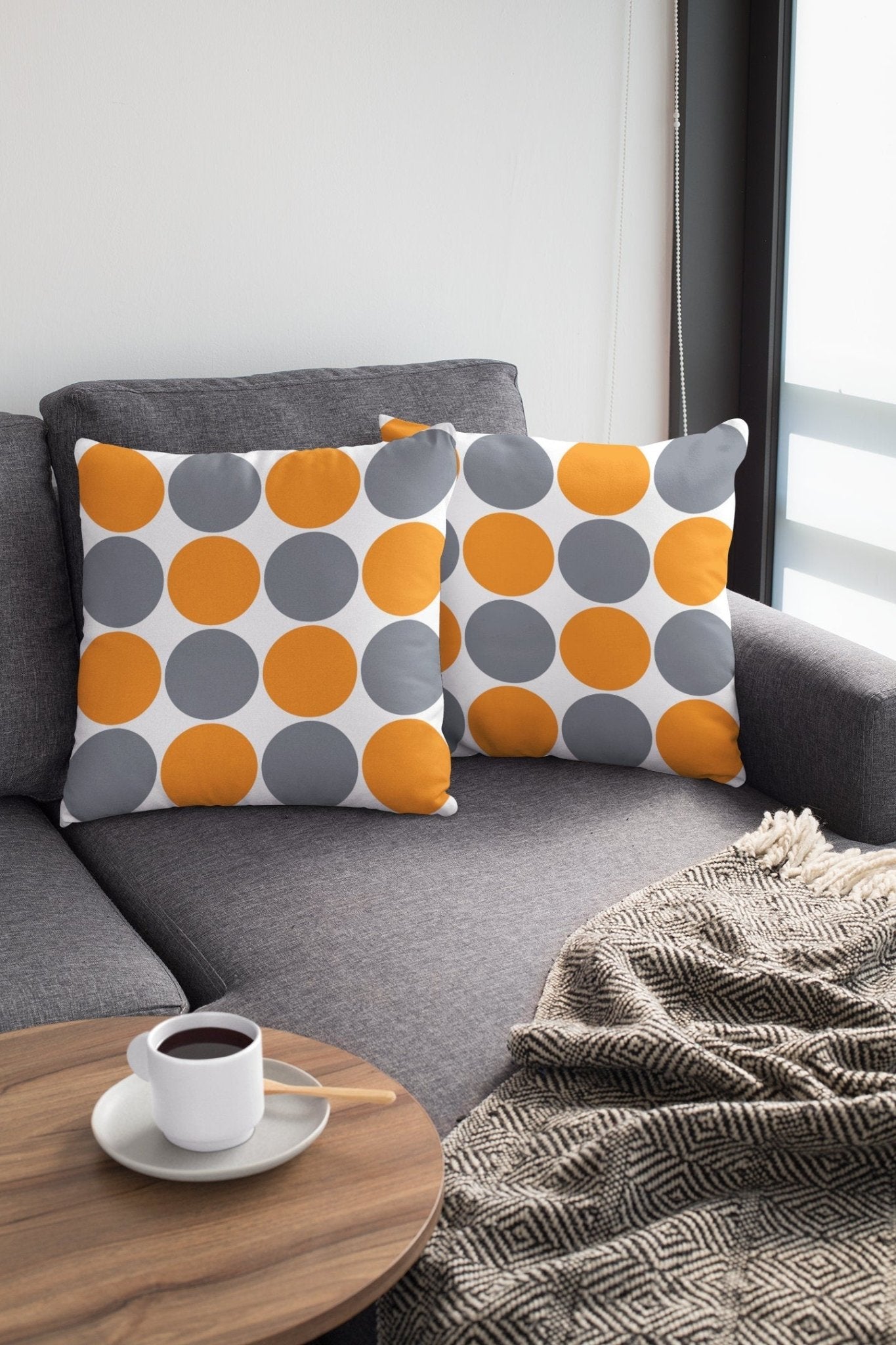 gray and orange throw pillows